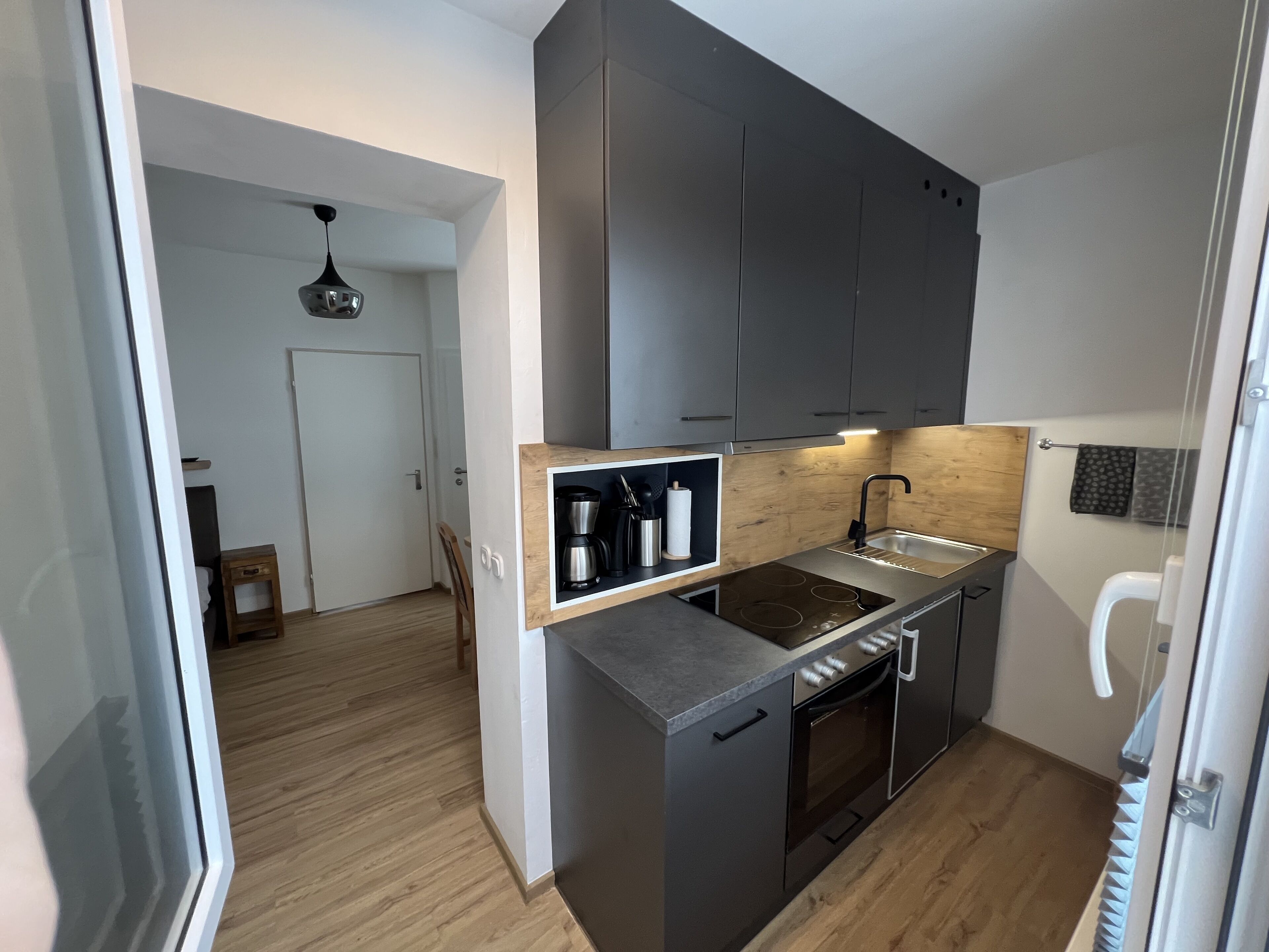 One-Bedroom Apartment Hochwurzen  | Private kitchenette | Full-sized fridge, oven, stovetop, dishwasher