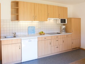 Apartment, Balcony (Westseite) | Private kitchen | Fridge, microwave, stovetop, dishwasher - Haus Karoline (Achenkirch)