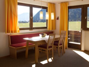 Apartment, Mountain View | Living area | Flat-screen TV - Haus Karoline (Achenkirch)
