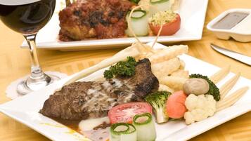 Breakfast, lunch, dinner served; international cuisine