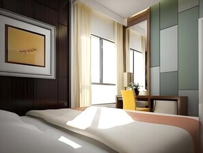 A hotel room with a bed, a desk, a chair, a mirror, and a window.