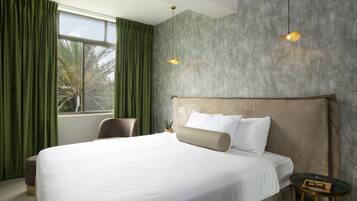 Habitación clásica | Minibar y caja de seguridad en la habitación