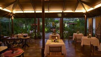 Breakfast, lunch served; local and international cuisine, garden views