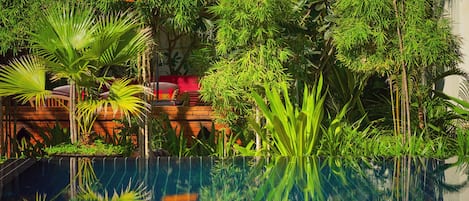 Outdoor pool, open 9 AM to 8 PM, pool umbrellas, sun loungers