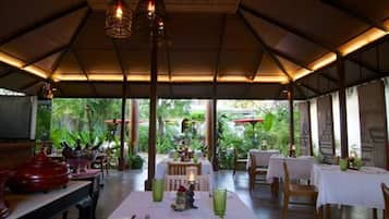 Breakfast, lunch served; local and international cuisine, garden views