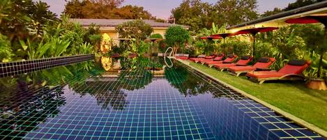 Outdoor pool, open 9 AM to 8 PM, pool umbrellas, sun loungers