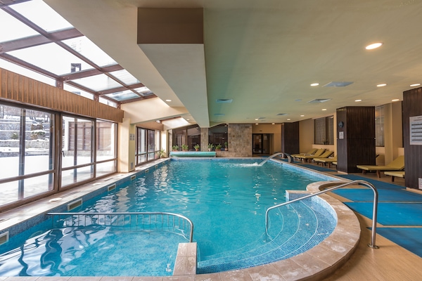 Indoor pool, sun loungers