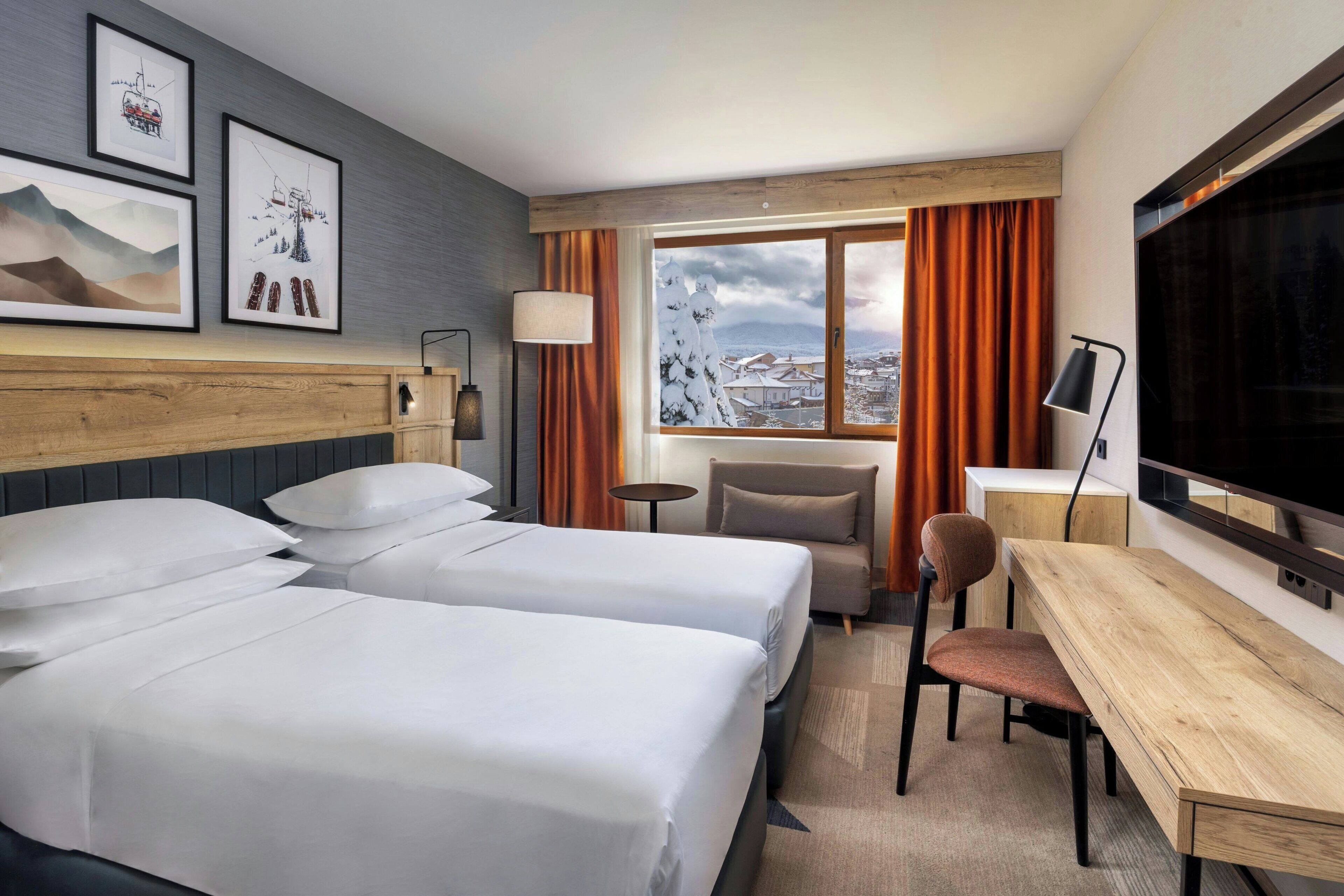 スタンダード ルーム   キングベッド 1 台ソファーベッド付き | ミニバー、セーフティボックス (室内)、デスク、ノートパソコン用作業スペース