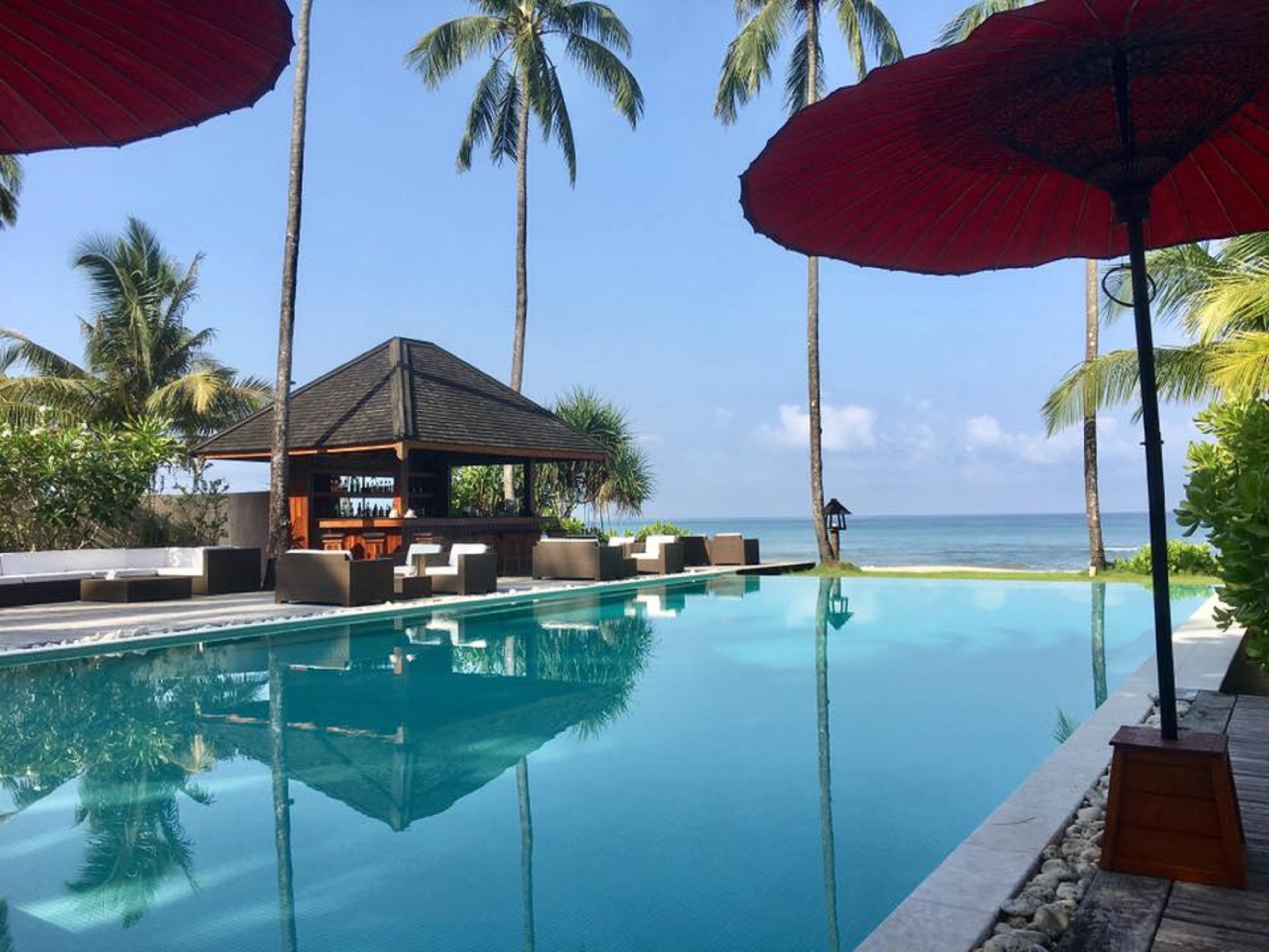 Seasonal outdoor pool, open 8 AM to 7 PM, pool umbrellas, sun loungers