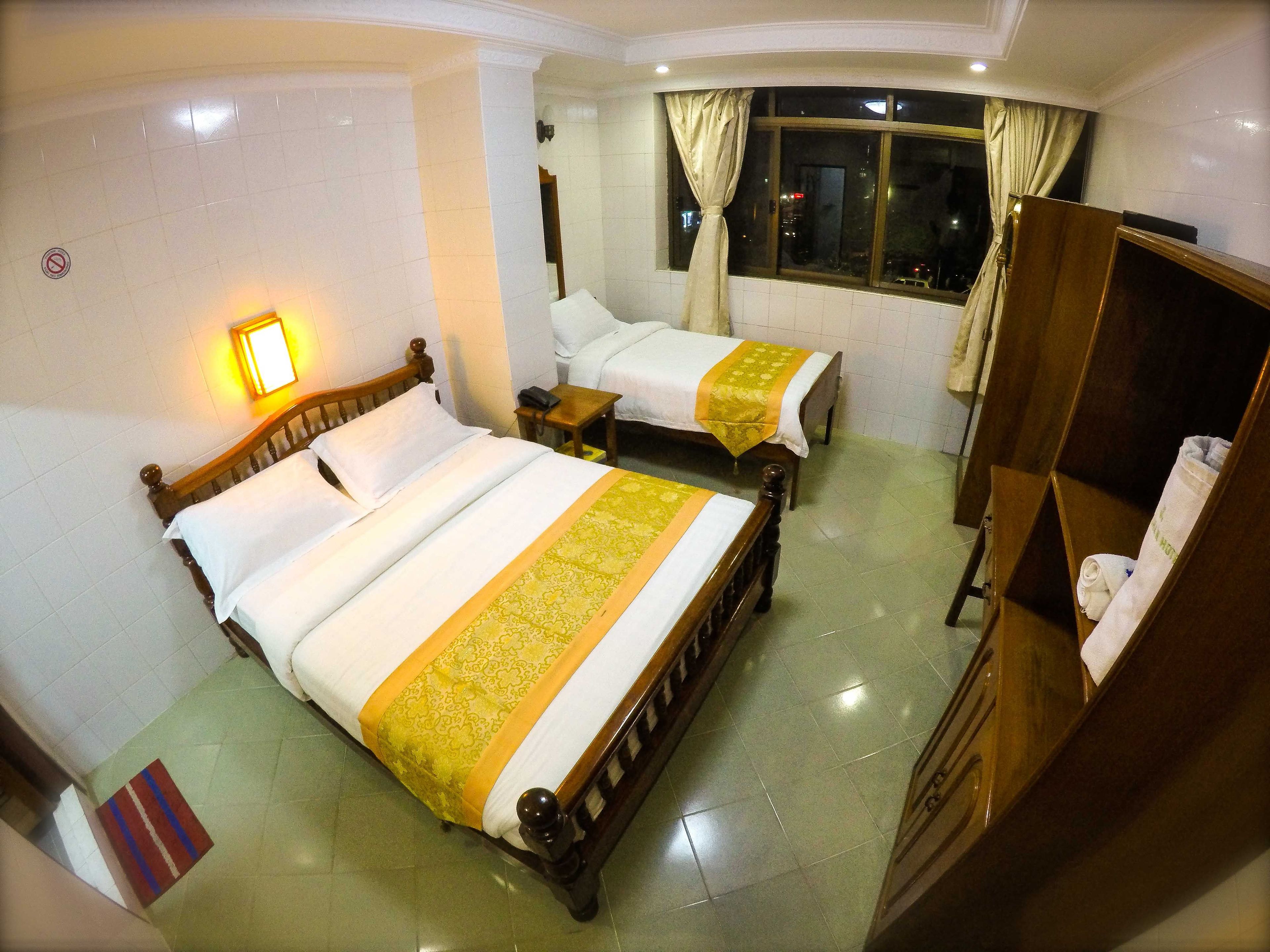 family room with sule pagoda view | in-room safe, desk, free wifi