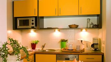 Deluxe-Suite, 1 Schlafzimmer, Balkon, Seeblick | Eigene Küche