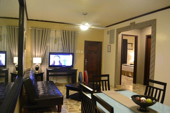 Resort, 2 Bedroom | Living area | Flat-screen TV