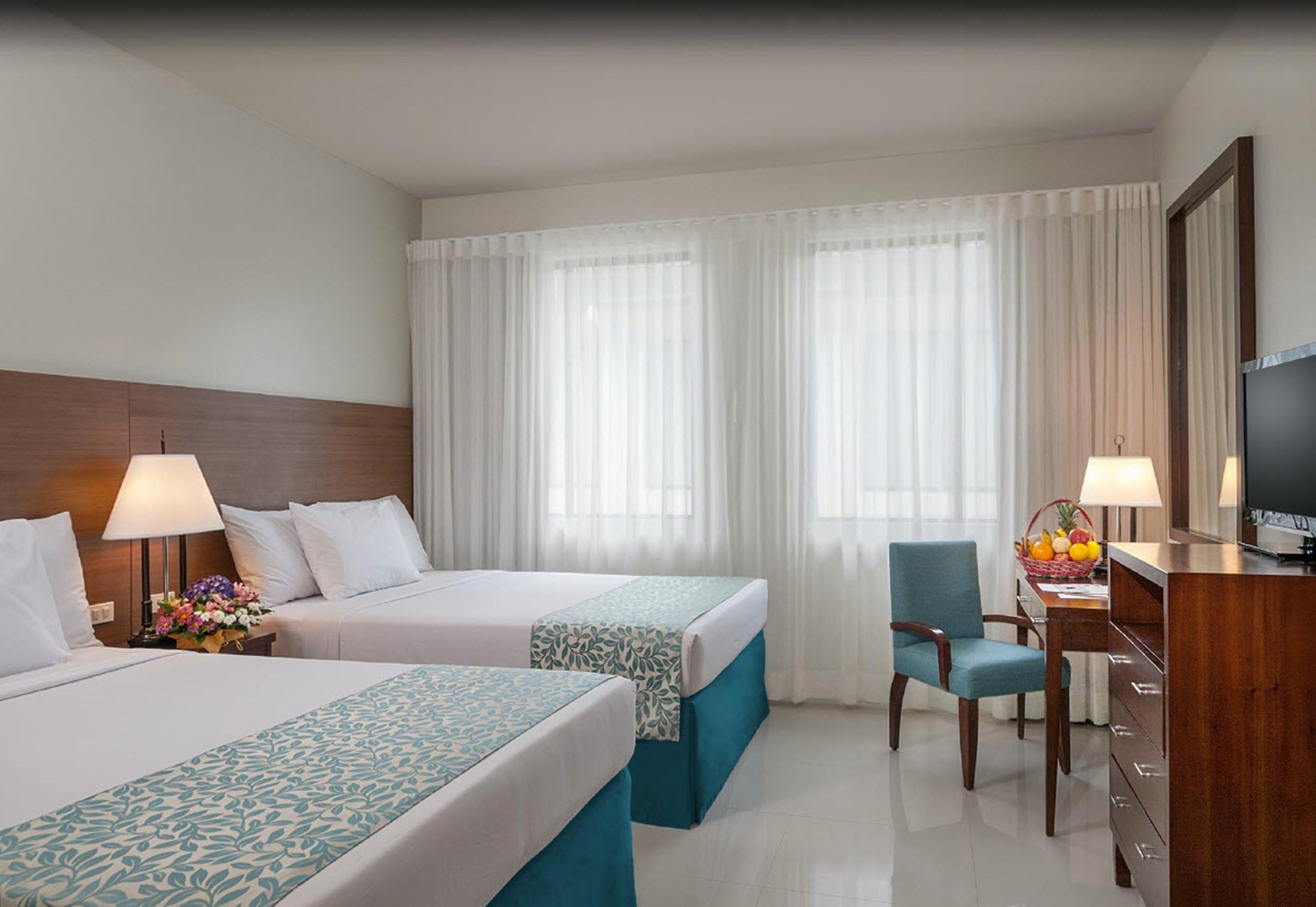 deluxe room | in-room safe, desk, blackout curtains, free wifi