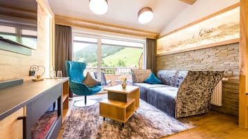 Suite Deluxe | 1 chambre, coffres-forts dans les chambres, bureau