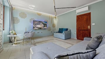Apartment, City View | Living area | LCD TV