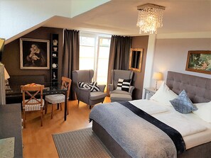 Comfort-studio (7 / incl. 65 EUR cleaning fee) | Oleskelualue | Taulutelevisio, kirjoja