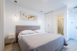 Luxury Apartment, 2 Bedrooms, Balcony, Sea View | In-room safe, desk, soundproofing, iron/ironing board