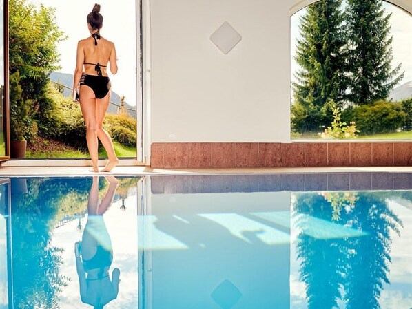 Indoor pool, open 8:00 AM to 9:00 PM, sun loungers