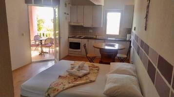 Apartment, Balcony | Living area | Flat-screen TV