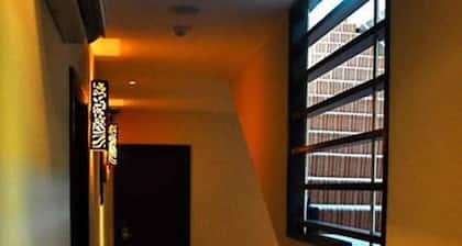 Tat Place Hotel and Café