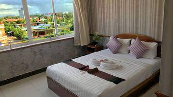 Standard Double Room | Minibar, in-room safe, desk, blackout drapes