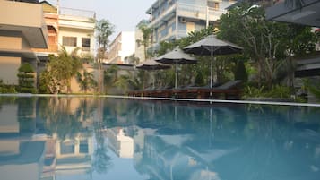 Outdoor pool, pool umbrellas, pool loungers