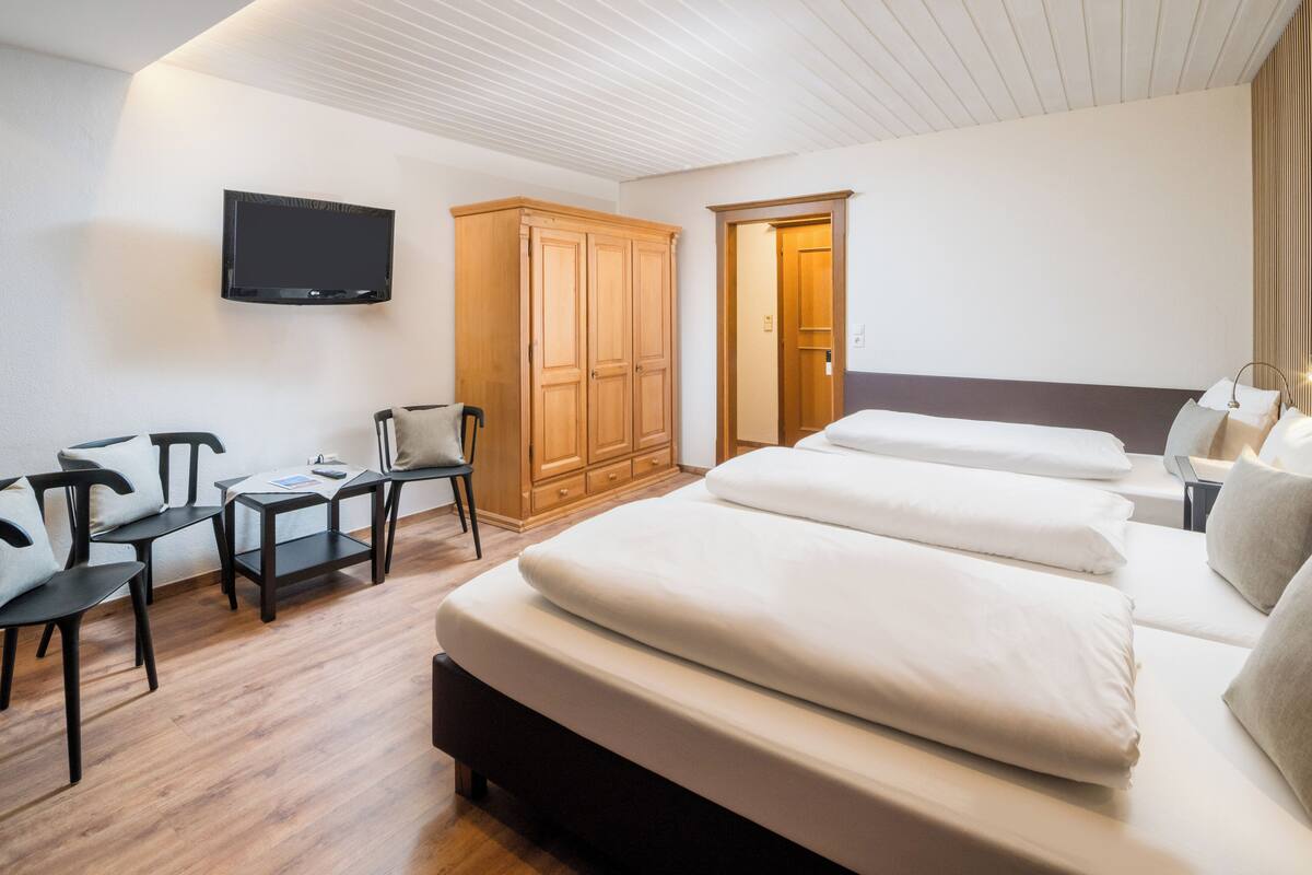 Alpine Triple Room, Balcony, Mountain View | Hypo-allergenic bedding available, WiFi (free), bed sheets