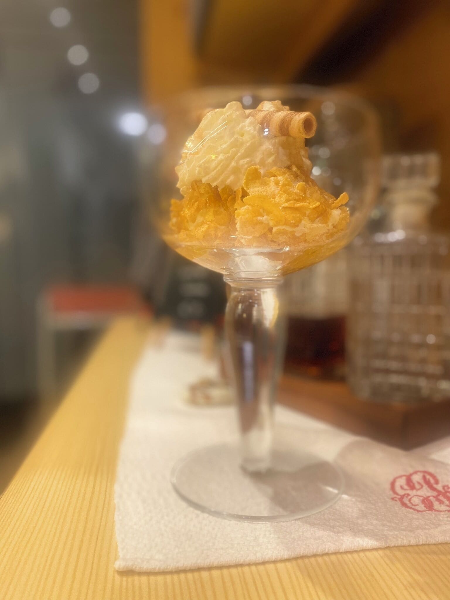 A dessert in a glass bowl on a table.