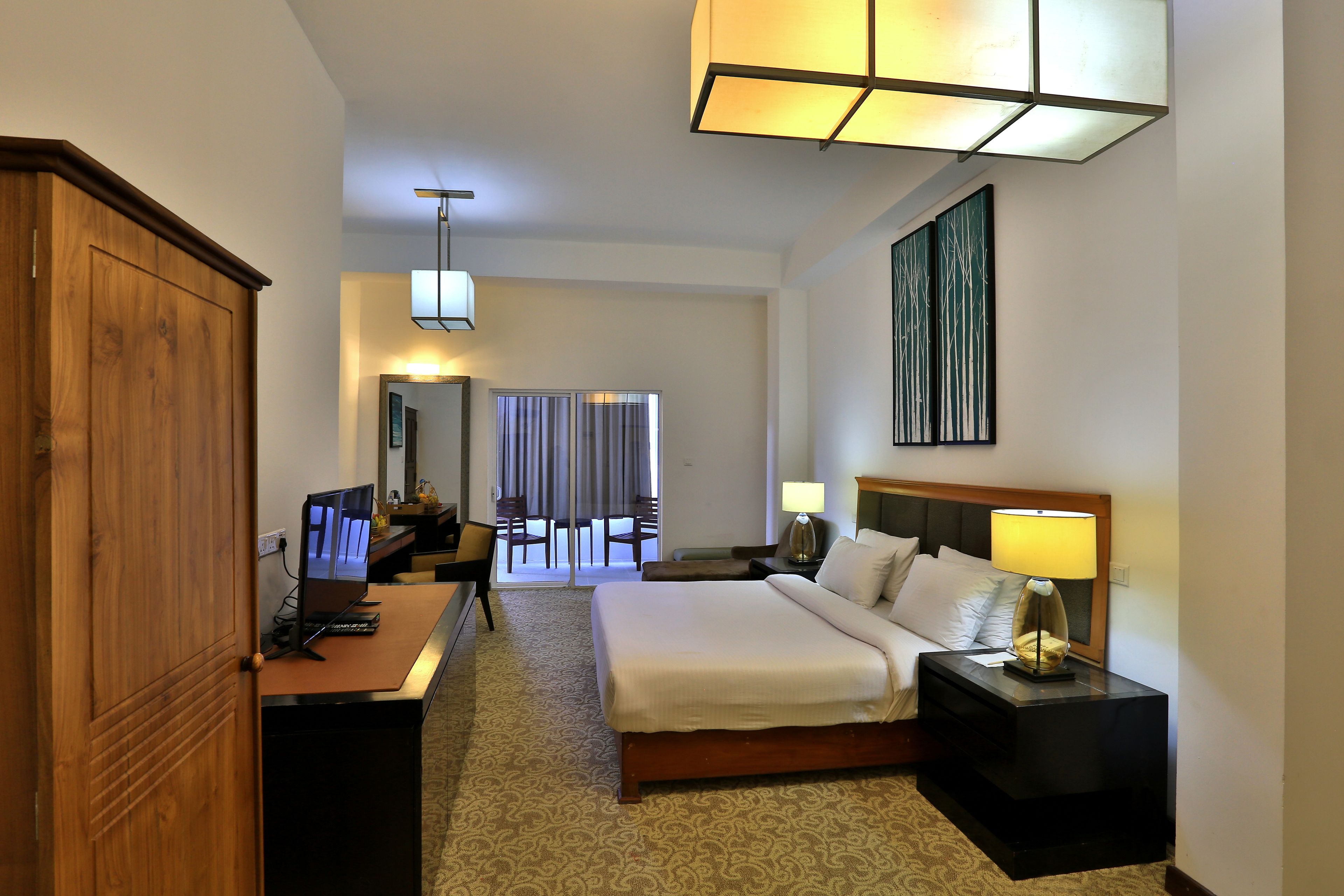 Standard Family Room | Minibar, in-room safe, desk, blackout curtains