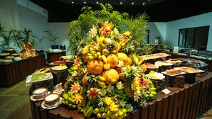 A buffet with a variety of fruits and desserts. - Camellia Resort and Spa (Avudangawa)