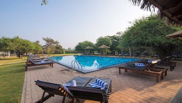 Outdoor pool, pool umbrellas, sun loungers
