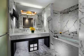 Separate tub and shower, free toiletries, hair dryer, bathrobes