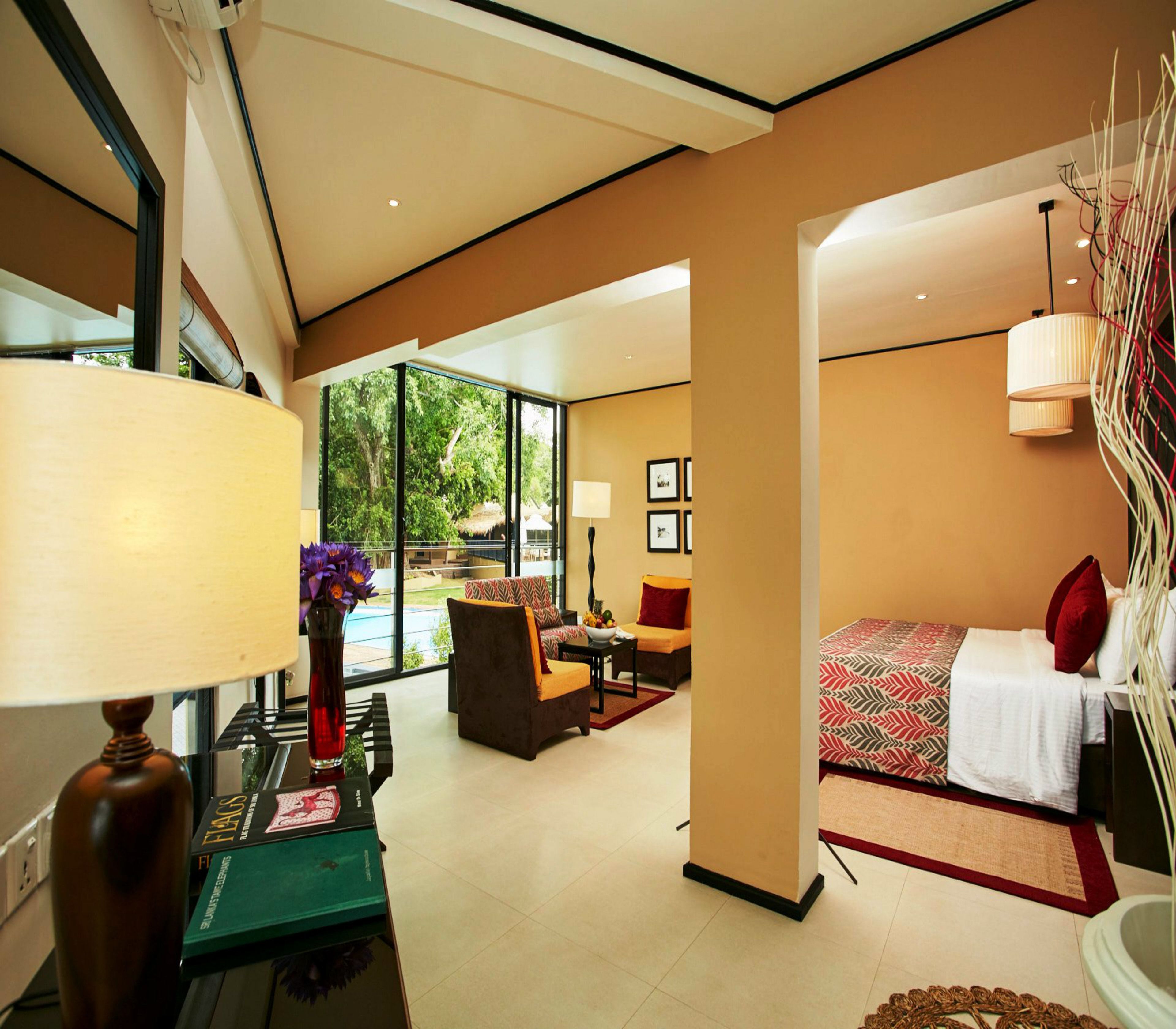 deluxe suite | minibar, in-room safe, desk, iron/ironing board