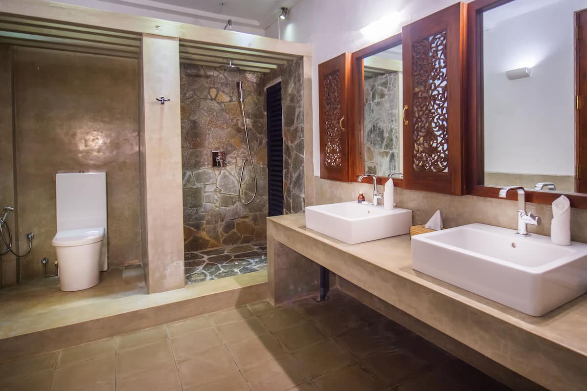 executive room with jacuzzi (10% off on food & beverage) | bathroom | shower, rainfall showerhead, free toiletries, slippers