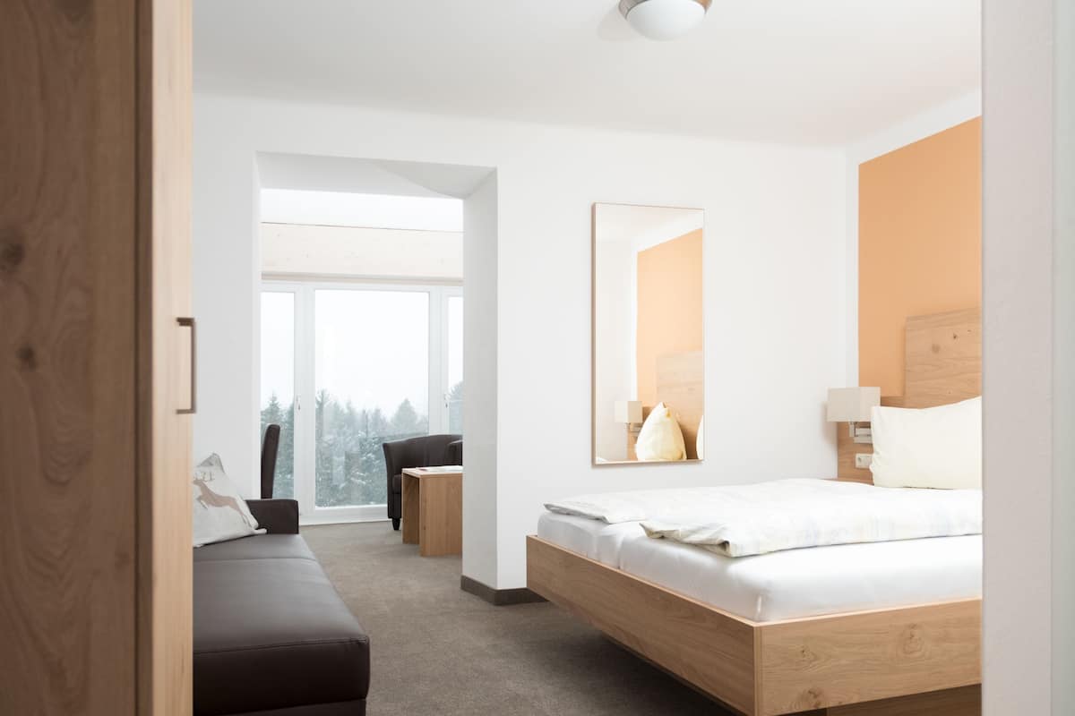 superior double room, mountain view | down duvets, minibar, in-room safe, desk