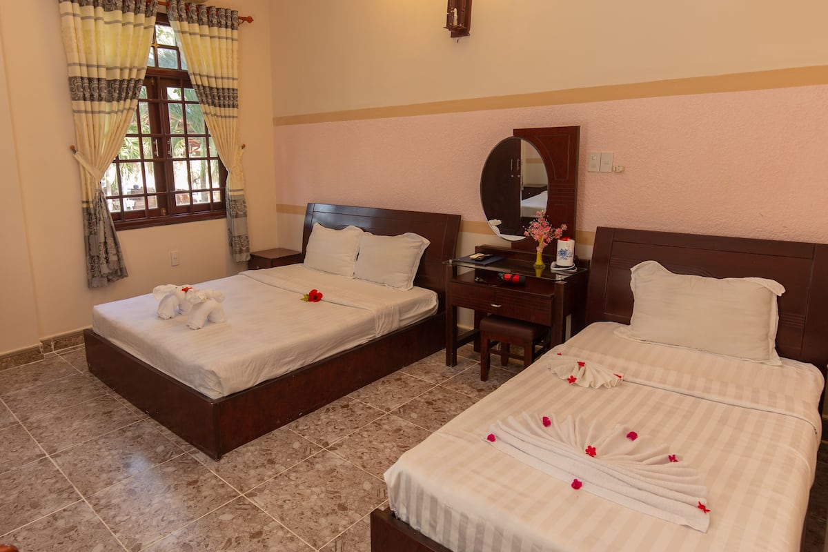 Deluxe Triple Room, 1 Bedroom, Garden View
