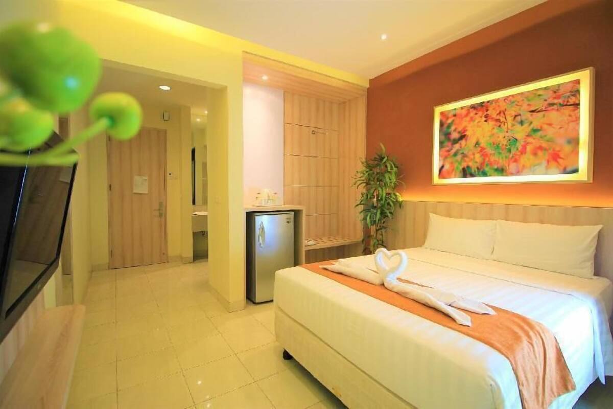 Desk, laptop workspace, blackout drapes, iron/ironing board