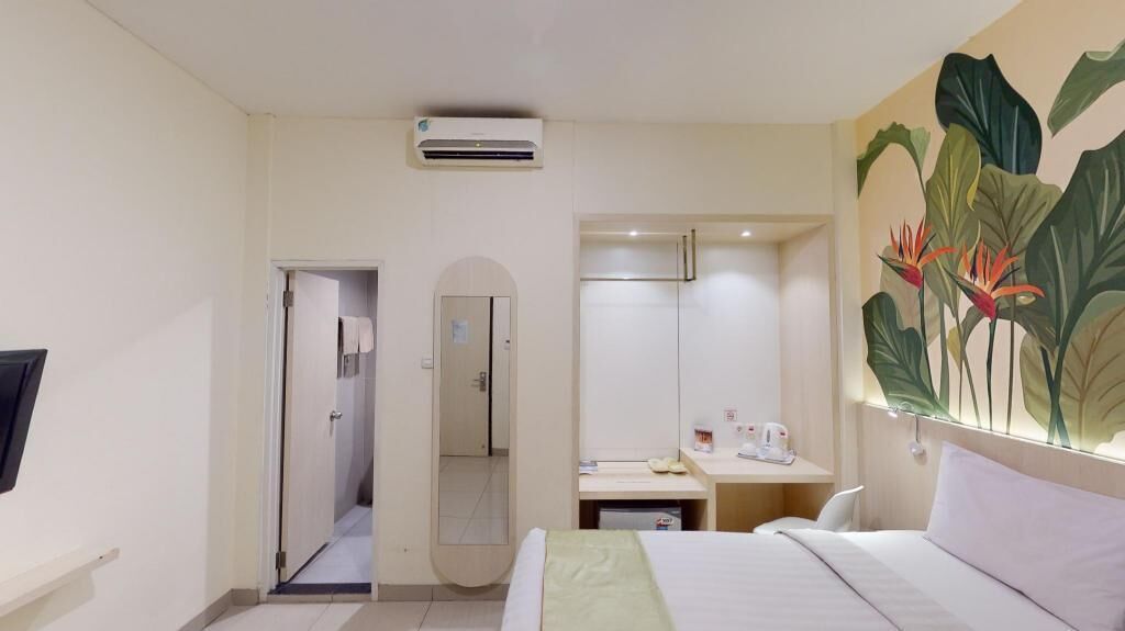 Desk, laptop workspace, blackout drapes, iron/ironing board