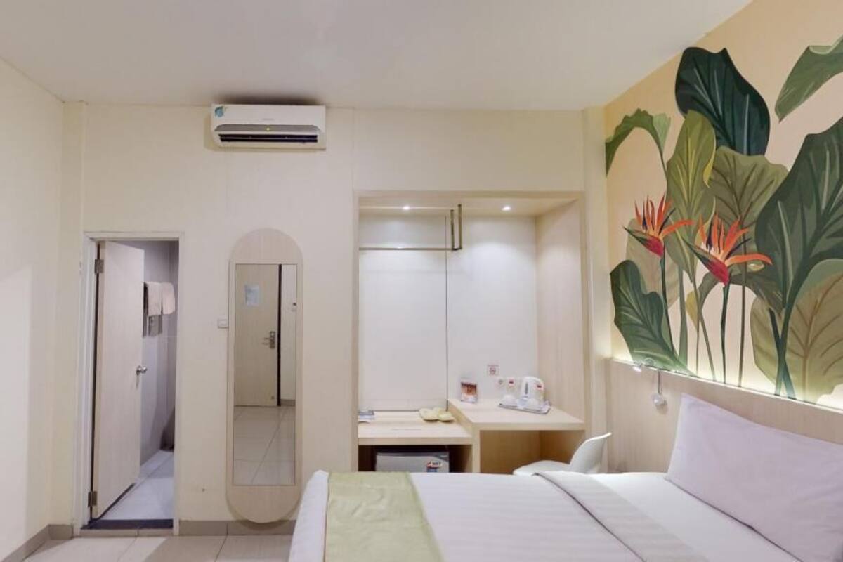 Desk, laptop workspace, blackout drapes, iron/ironing board