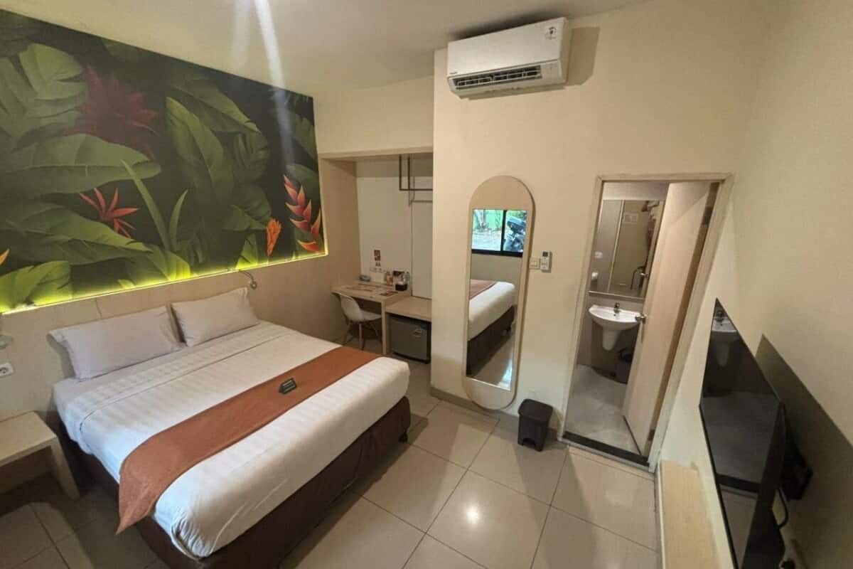 Desk, laptop workspace, blackout drapes, iron/ironing board