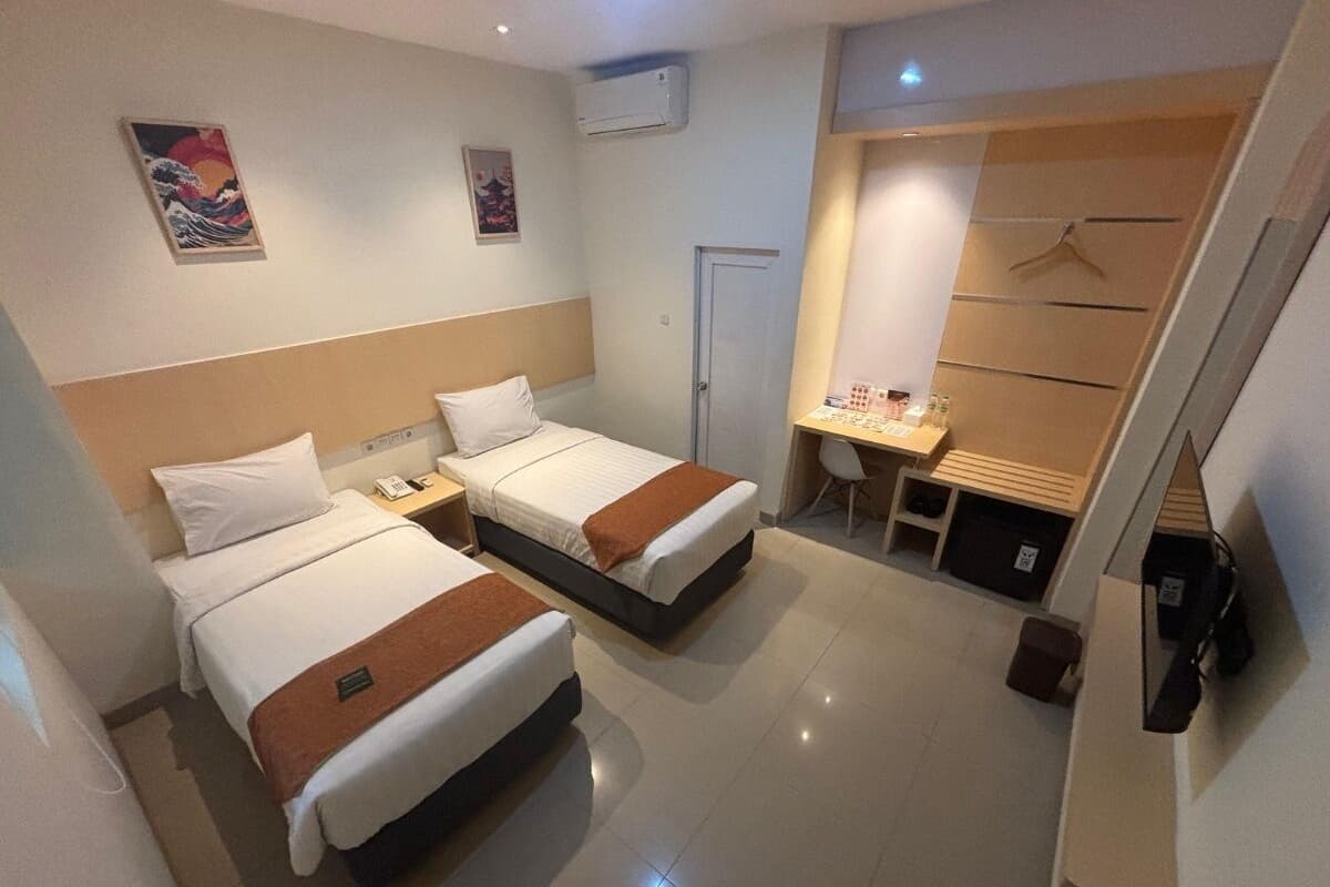 Desk, laptop workspace, blackout drapes, iron/ironing board