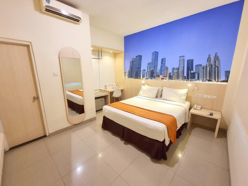 Desk, laptop workspace, blackout drapes, iron/ironing board