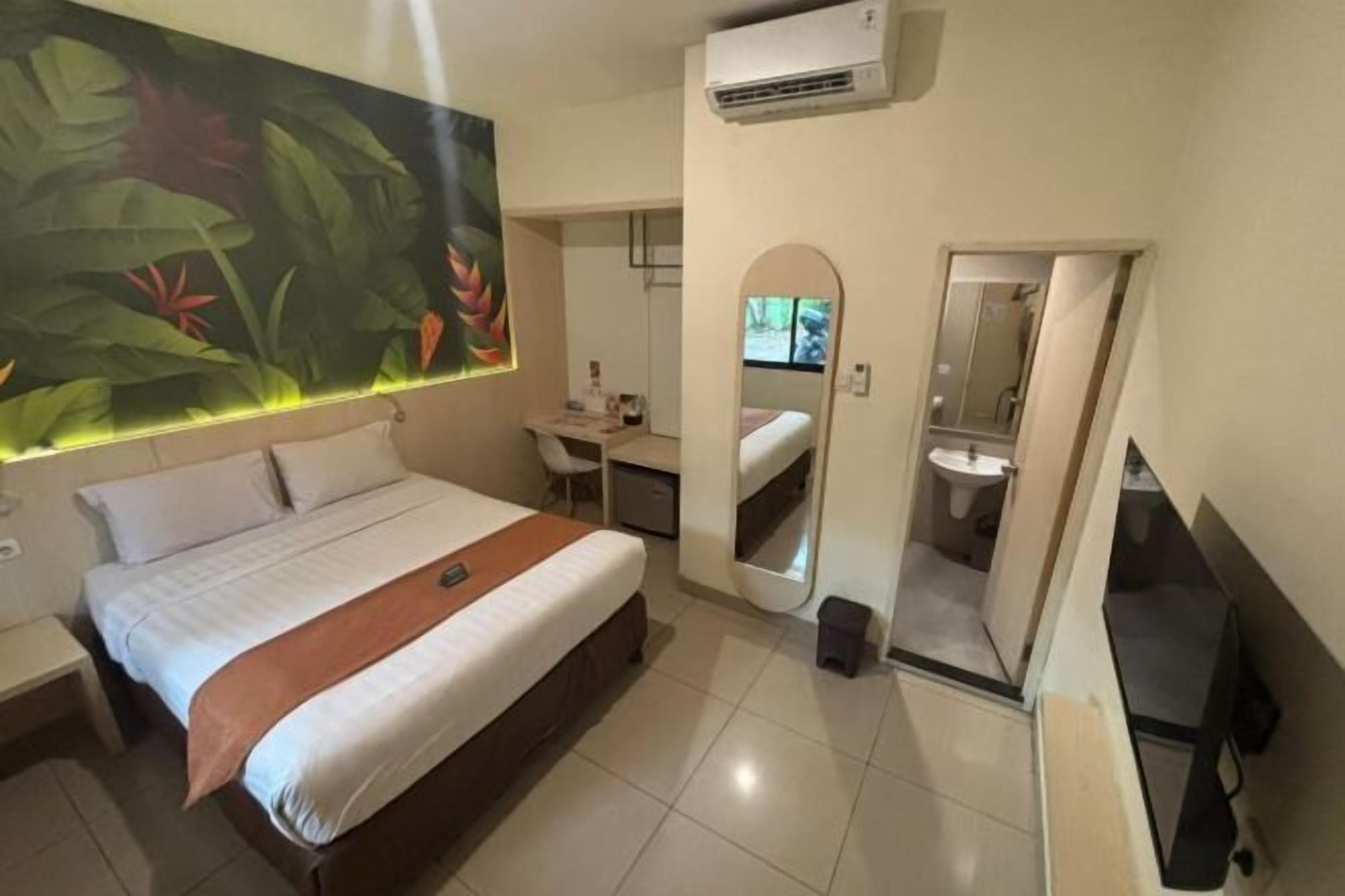 Desk, laptop workspace, blackout drapes, iron/ironing board