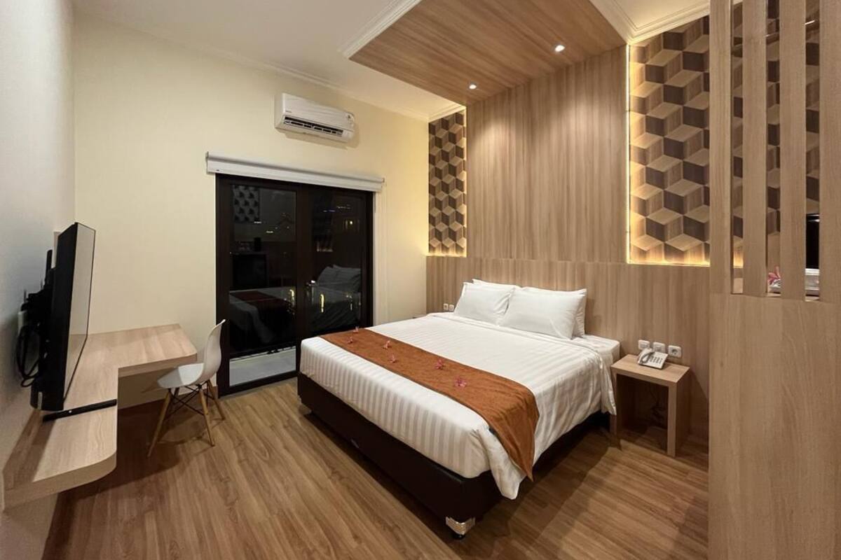 Desk, laptop workspace, blackout drapes, iron/ironing board