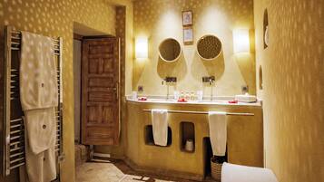 Suite | Bathroom | Designer toiletries, hair dryer, bathrobes, towels