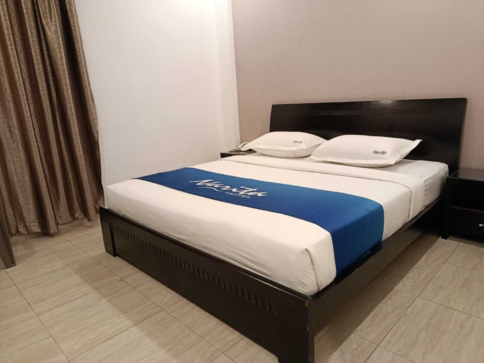 Deluxe-Doppel- oder -Zweibettzimmer, 1 Doppelbett oder 2 Einzelbetten | Zimmersafe, Schreibtisch, kostenloses WLAN, Bettwäsche