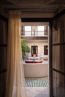 Deluxe Suite | Egyptian cotton sheets, premium bedding, in-room safe