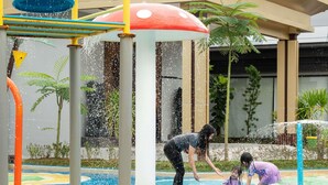 A water play area with colorful structures and a pool. - Novotel Pontianak Convention Centre (Pontianak)