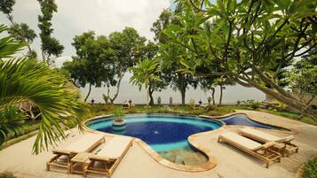 Outdoor pool, pool umbrellas, sun loungers