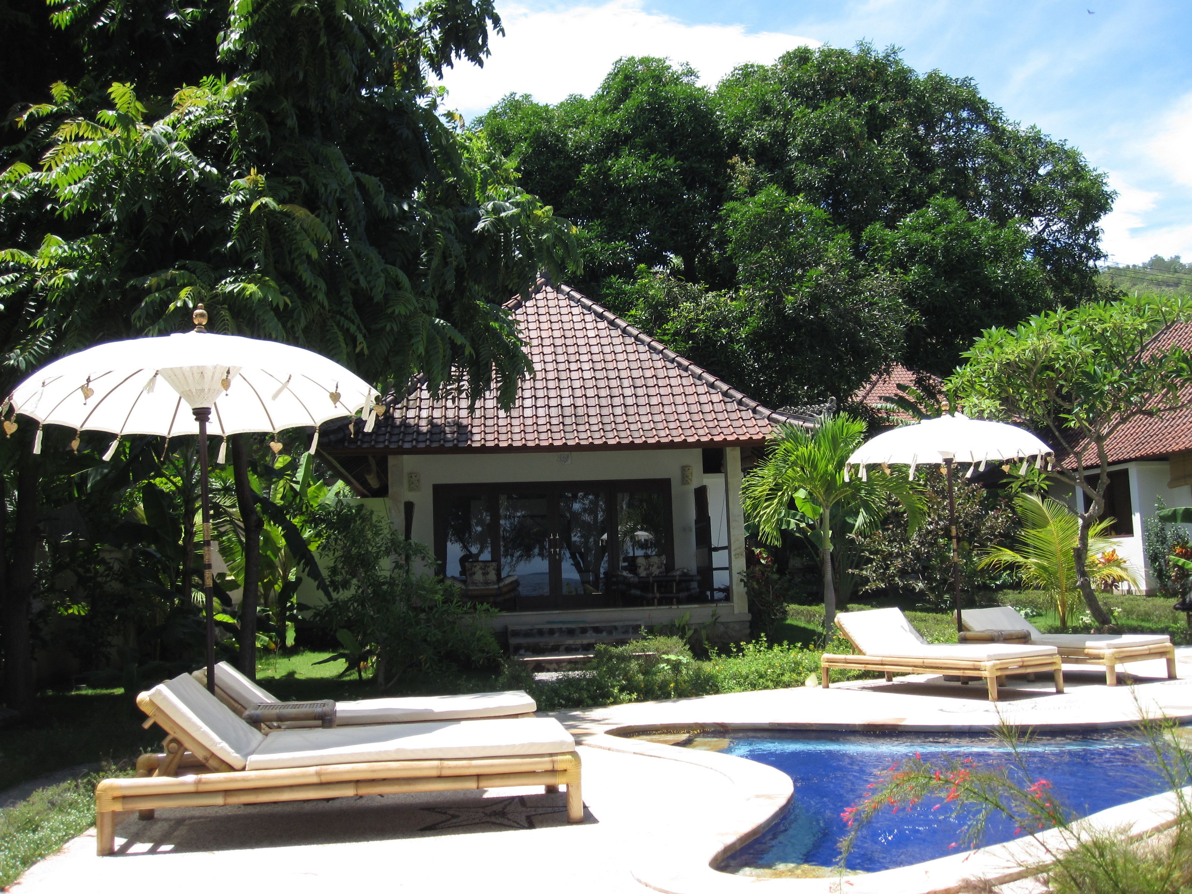 outdoor pool, pool umbrellas, pool loungers
